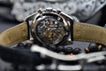 Omega Speedmaster Professional Moonwatch sapphire case back and exposed Co-Axial Master Chronometer movement, angled detail shot