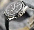 Omega Speedmaster Professional Moonwatch stainless steel case side profile showing screw-down crown and chronograph pushers