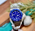 Tudor Pelagos 42 blue dial and titanium bracelet, close-up angled lifestyle shot